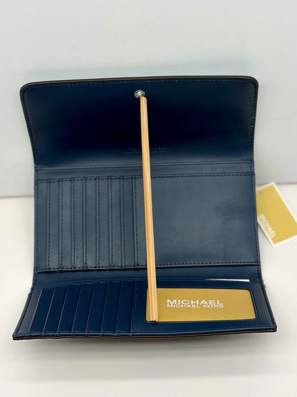 Michael Kors wallet coated